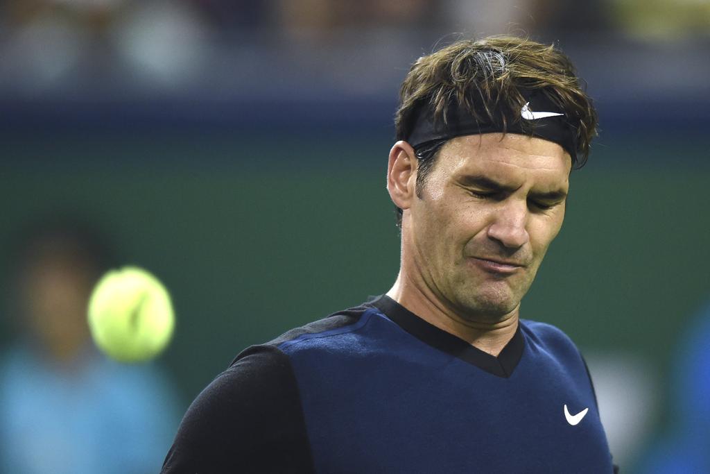 O suíço Roger Federer caiu diante do espanhol Albert Ramos-Vinolas. | Aly Song/Reuters