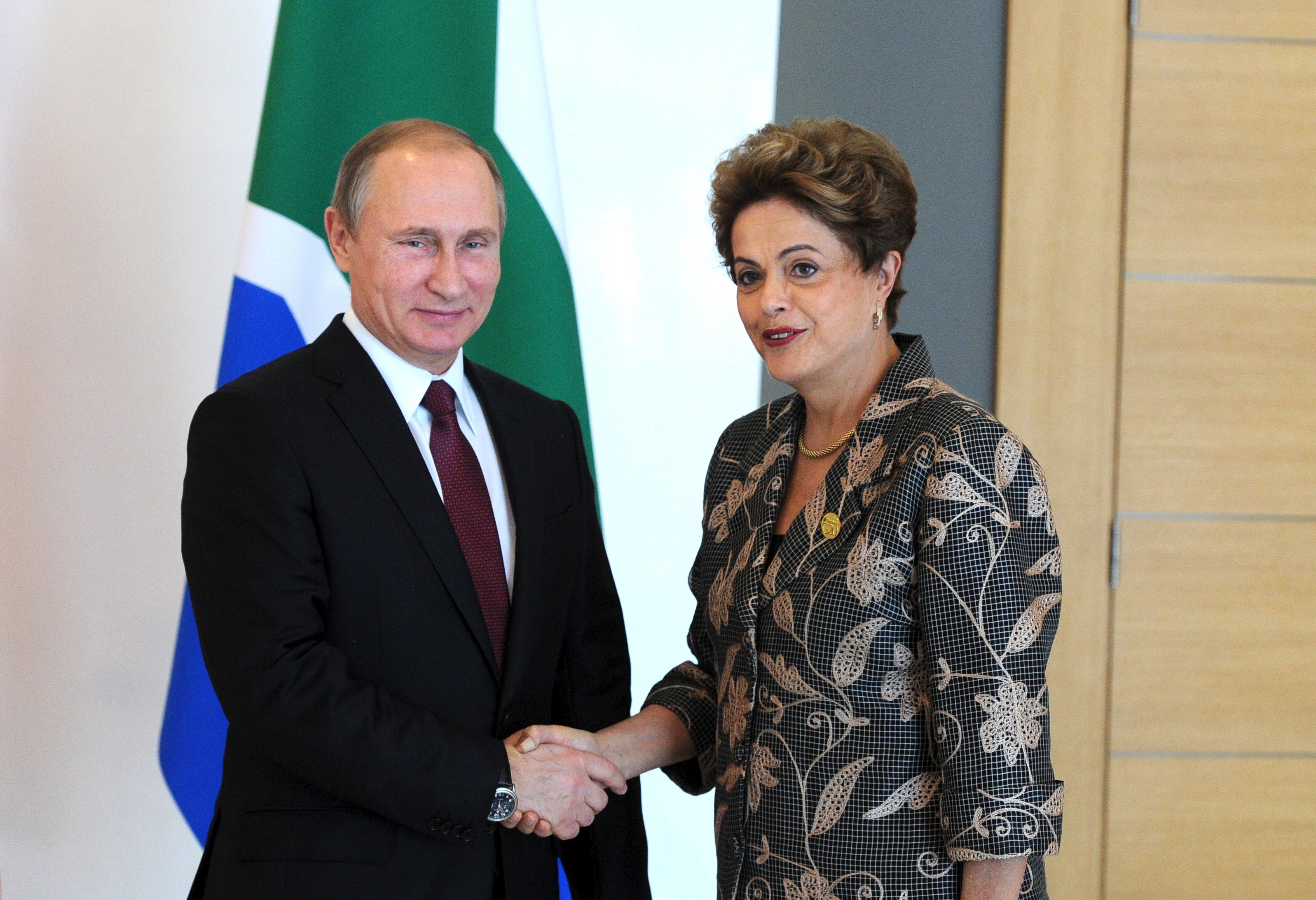 Dilma Rousseff com o presidente da Rússia Vladimir Putin durante encontro do g20: defesa da CPMF. | Ria NovostiI/Reuters