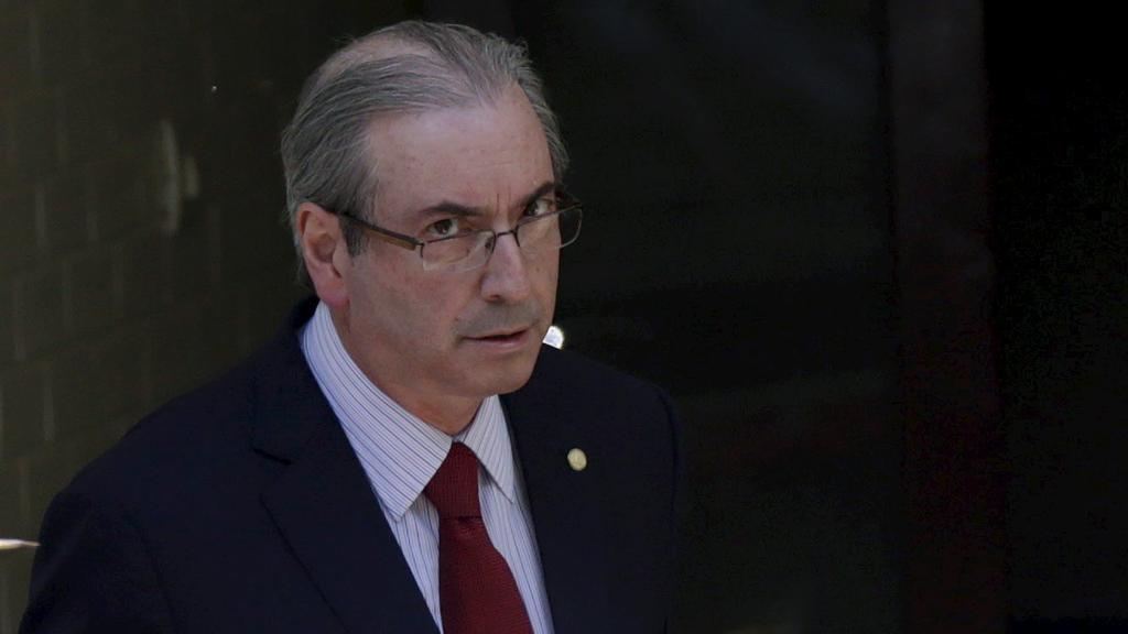 Cunha na saída de sua casa em Brasília, que foi alvo da PF. | Ueslei Marcelino/Reuters