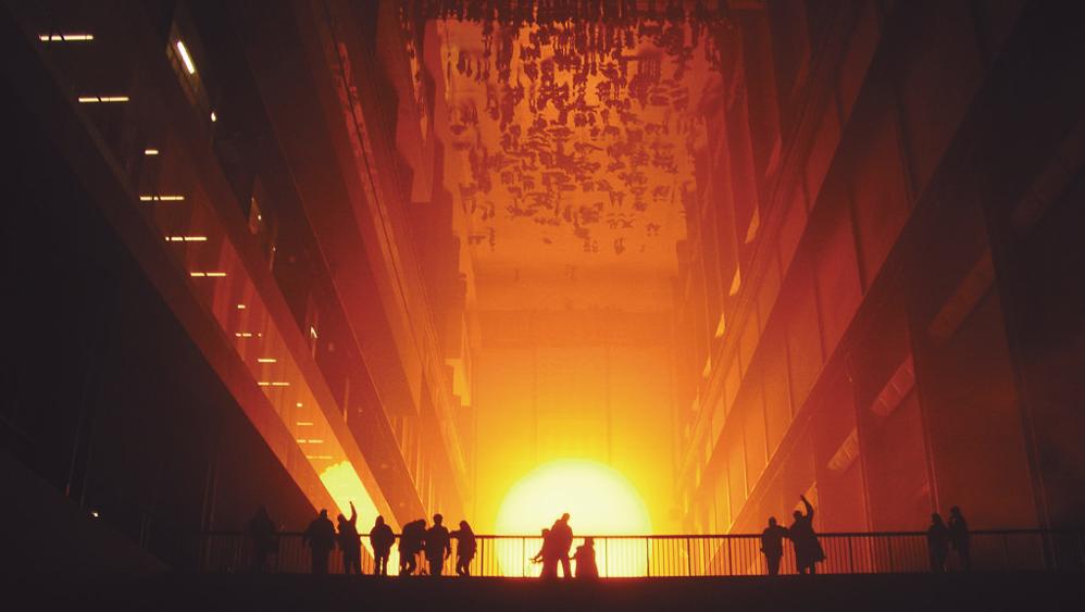“Weather Project”, a instalação de Olafur Eliasson que simulou um pôr do sol dentro do Turbine Hall, no Tate Modern, em Londres, no ano de 2003. | Nathan Williams/Creative Commons