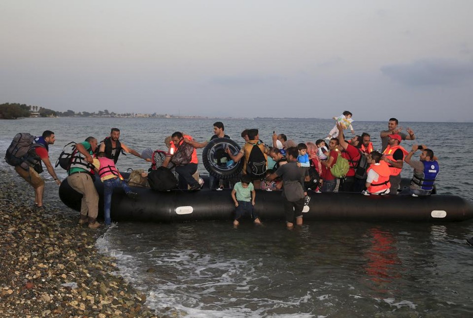 Refugiados sírios chegando à ilha de Kos, na Grécia, em agosto | YANNIS BEHRAKIS/REUTERS