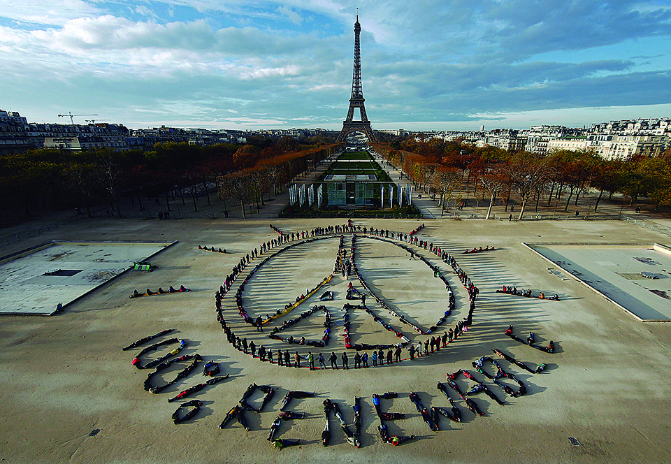 Os 195 países se comprometeram em Paris a zerar as emissões de CO2 na segunda metade do século. | Benoit Tessier/Reuters