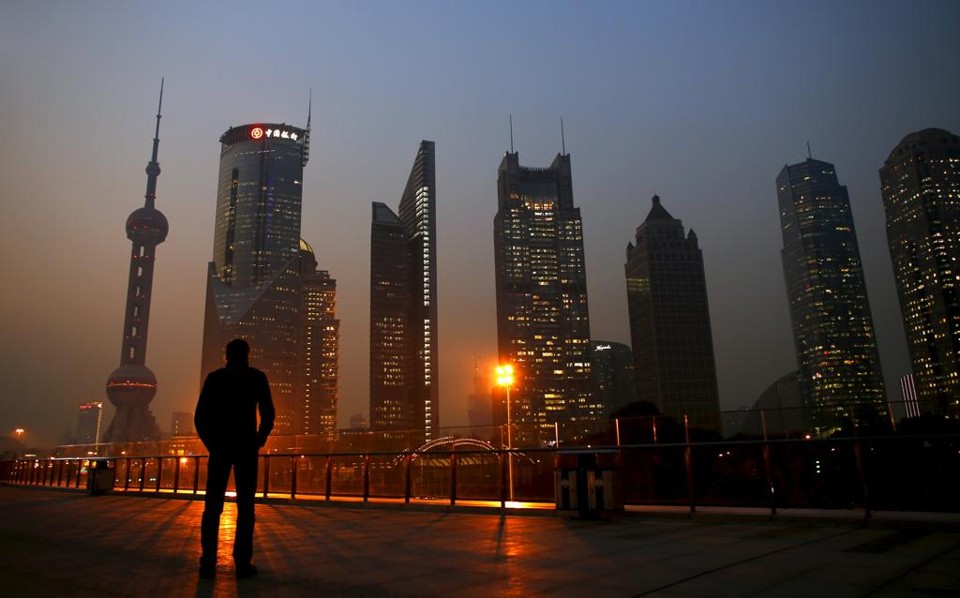 A recente valorização da taxa de câmbio efetiva real do iuan colocou pressão sobre as exportações chinesas, disse o banco central | Carlos Barria/REUTERS