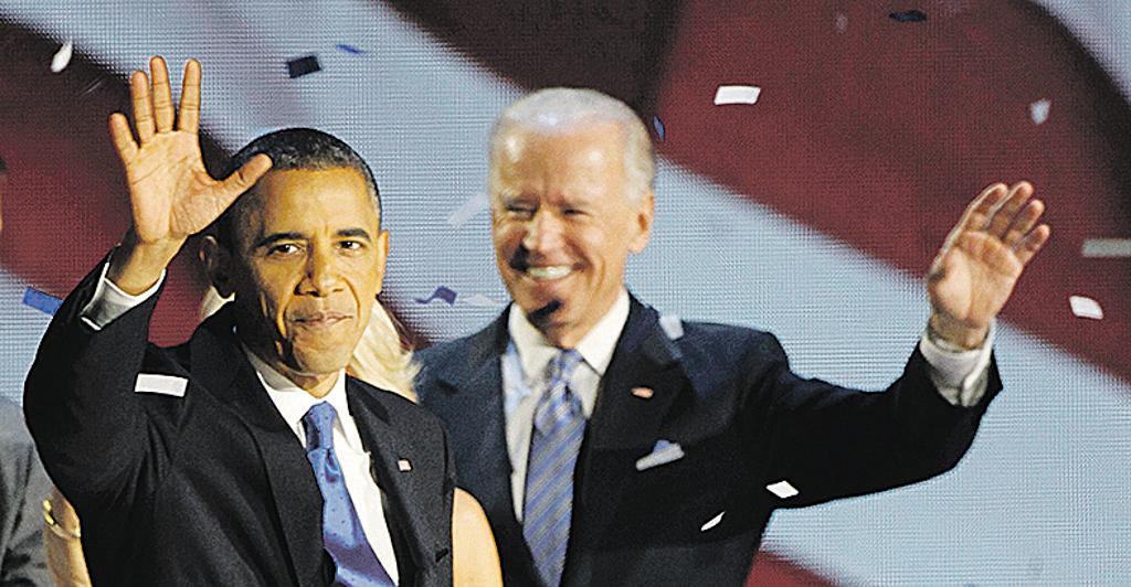 O atual presidente Barack Obama e o vice, Joe Biden, comemoram a reeleição em 2012. | Jim Bourg