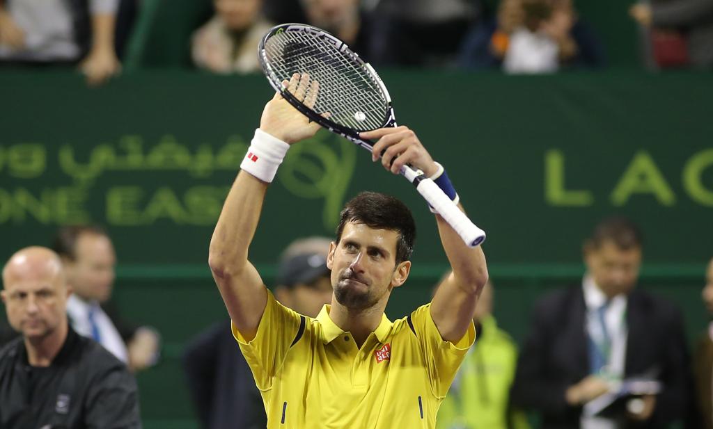 Tenista sérvio Novak Djokovic começou o ano como terminou o anterior: com título | KARIM JAAFAR/AFP