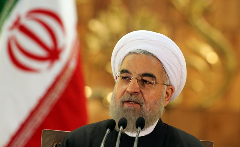 Hassan Rohani, presidente iraniano: “estendemos a mão ao mundo em sinal de paz e, deixando para trás todas as hostilidades, suspeitas e complôs, viramos uma nova página nas relações do Irã com o mundo” | ATTA KENARE/AFP