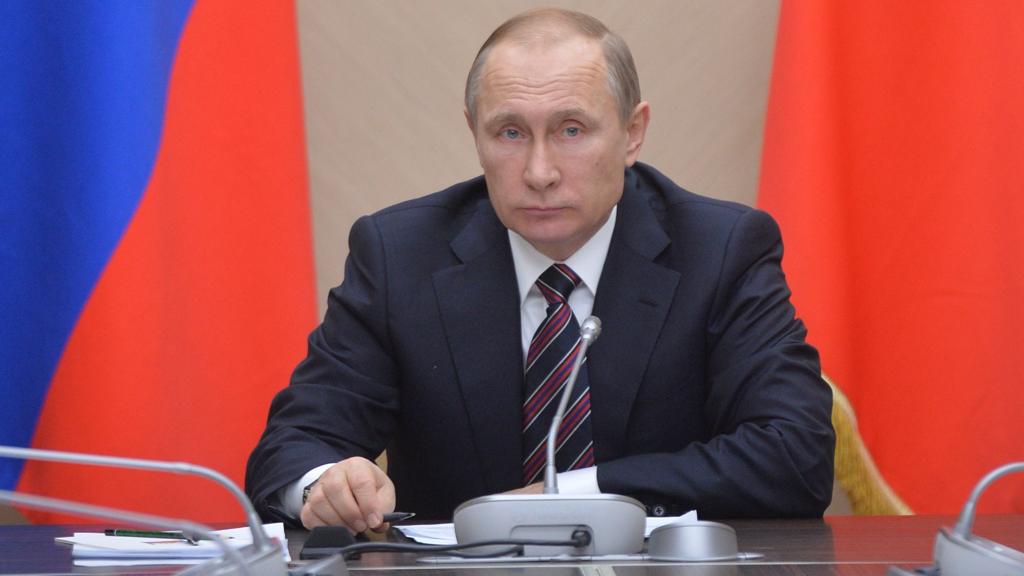 O presidente russo Vladimir Putin teria conhecimento dos casos de doping do atletismo de seu país, segundo relatório. | Alexei Druzhinin/AFP