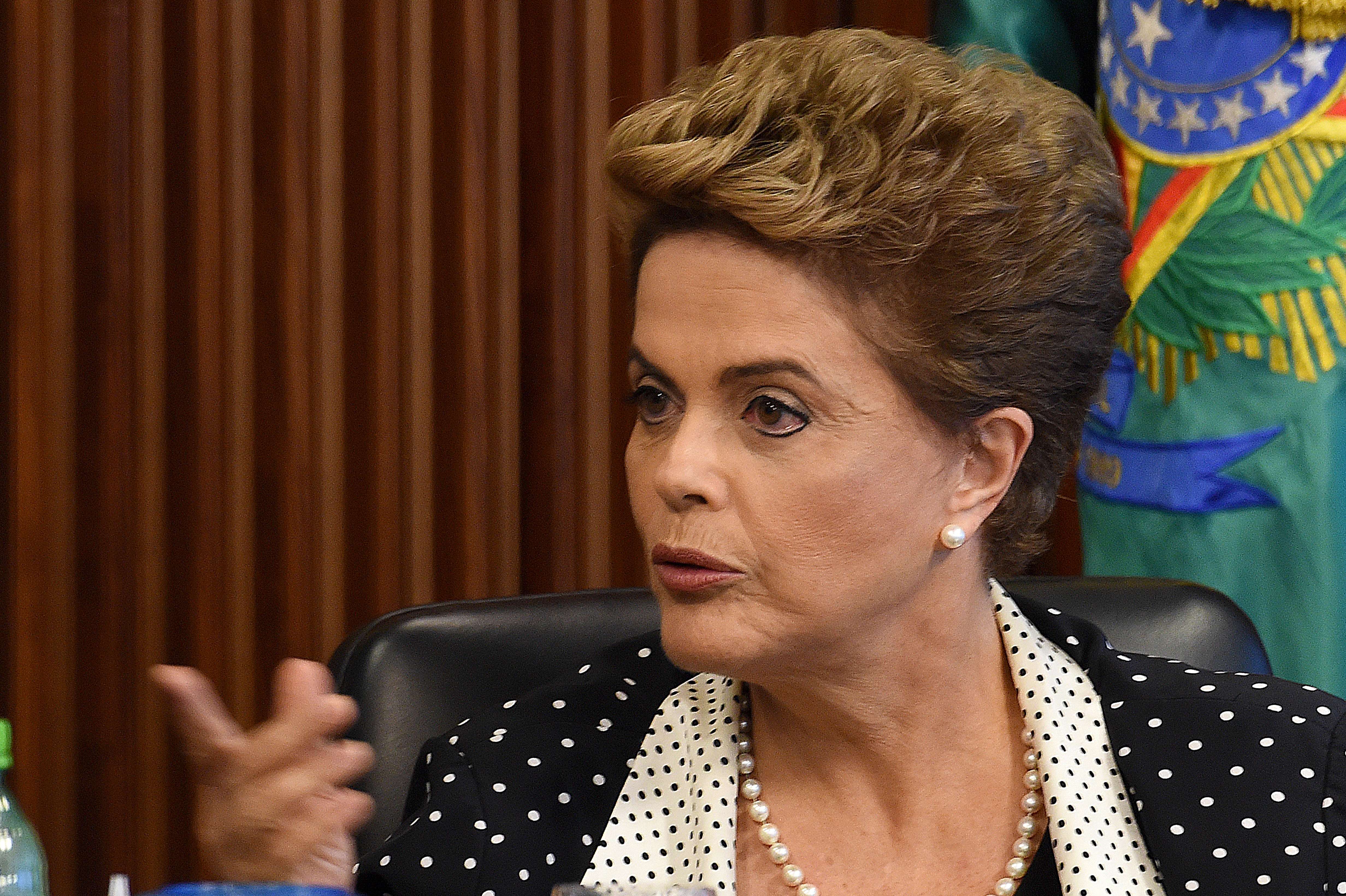 Numa tentativa de reaproximação com o Legislativo, Dilma vai à abertura dos trabalhos no Congresso. | Evaristo Sá/AFP