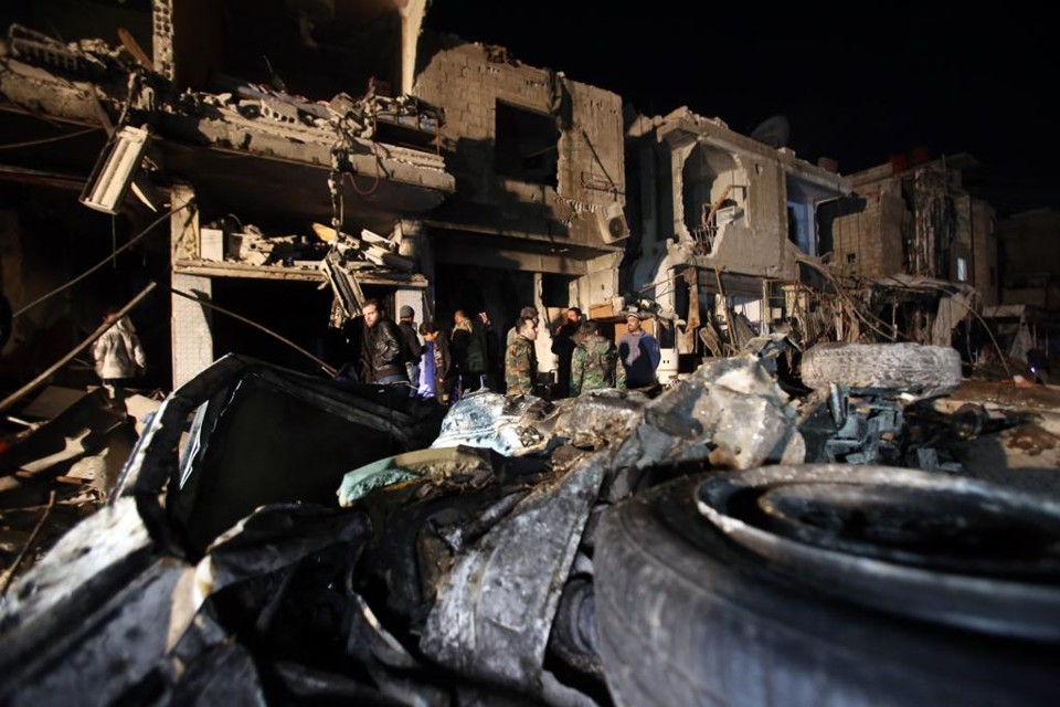 Destruição causado por ataque suicida do Estado Islâmico em Damasco | YOUSSEF KARWASHAN/AFP