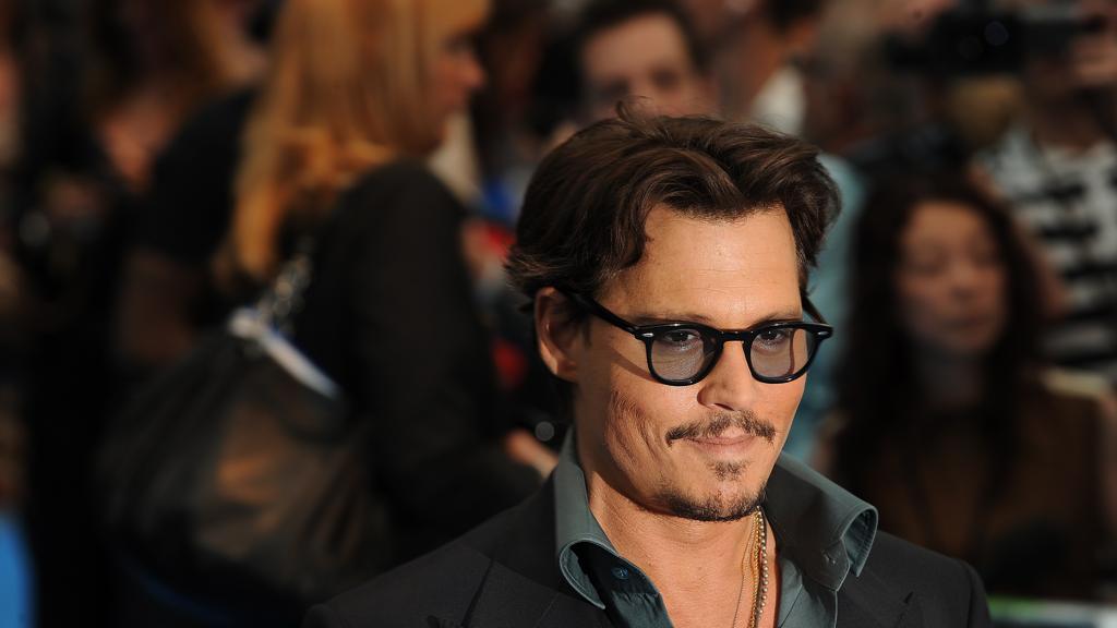 Depp toca com sua banda, Hollywood Vampires, na noite do dia 15 de fevereiro, quando ocorre a entrega dos prêmios Grammy. | bs/dan/BEN STANSALL