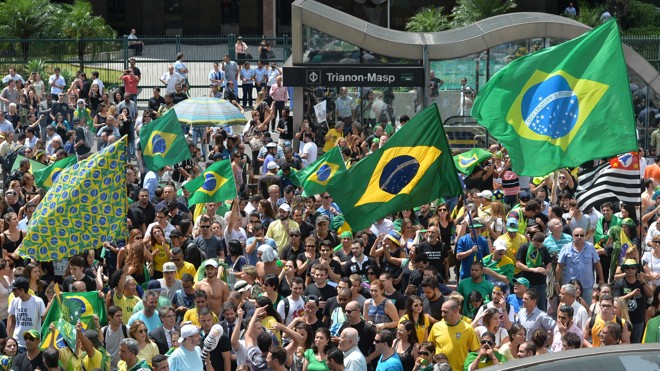 Em São Paulo, centenas de pessoas se reúnem em protesto contra o governo Dilma e a nomeação de Lula como ministro. Foto: | NELSON ALMEIDA/AFP