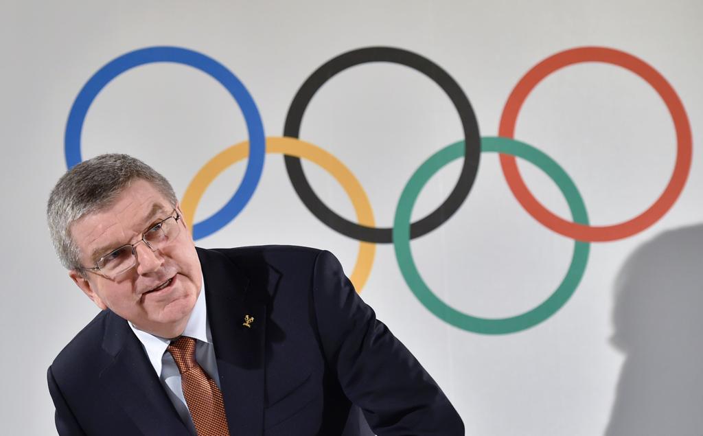 Thomas Bach, presidente do COI: federações tiveram que abrir mão de algumas coisas pela redução de gastos na Rio-2016. | FABRICE COFFRINI/AFP