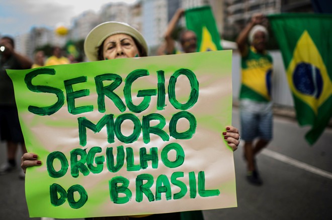 Cidadãos orgulham-se do trabalho do juiz no Rio de Janeiro. Foto: | CHRISTOPHE SIMON/AFP