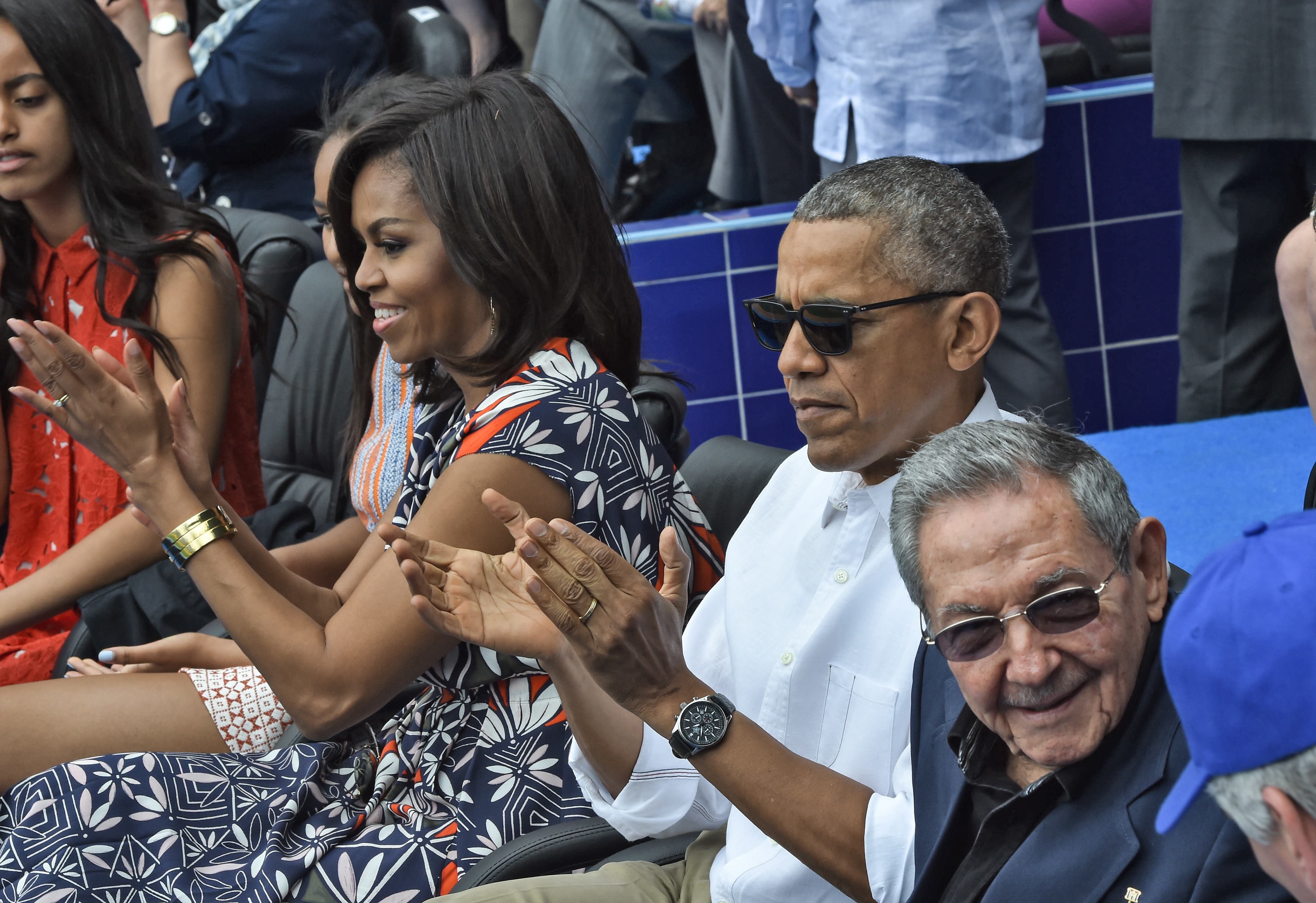 Obama, Michelle e Raúl Castro em jogo de beisebol | NICHOLAS KAMM/AFP