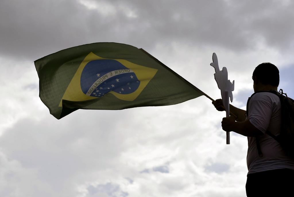 A manifestação em Belo Horizonte começou por volta das 10h e reuniu, segundo a Polícia Militar, 30 mil pessoas na praça da Liberdade | Douglas Magno/AFP