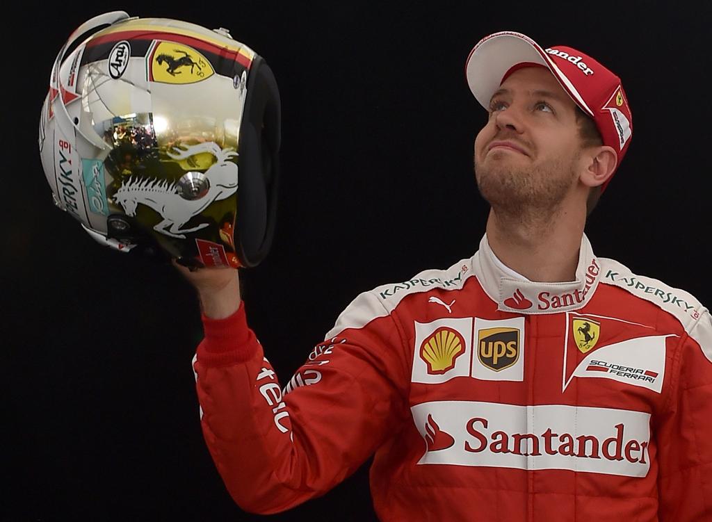 Vettel está satisfeito com o novo chassi e motor da Ferrari. | PAUL CROCK/AFP