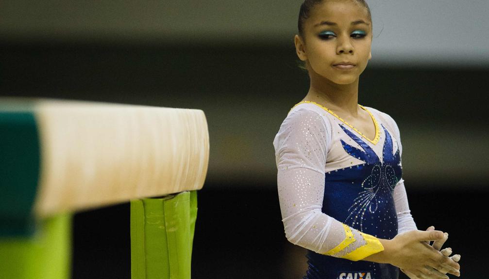 Flávia Saraiva foi ouro no solo e prata na trave em evento-teste no Rio de Janeiro. | Yasuyoshi Chiba/AFP