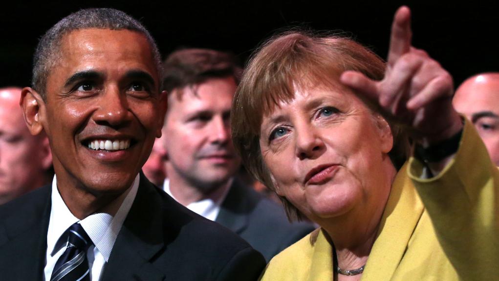 Obama e Angela Merkel durante encontro em Hannover | Ronny Hartmann/AFP