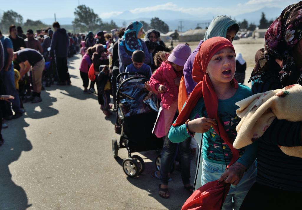 Refugiados na costa grega | Daniel Mihailescu/AFP