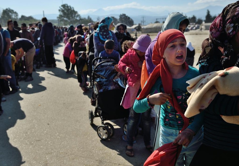 Refugiados na costa grega | Daniel Mihailescu/AFP
