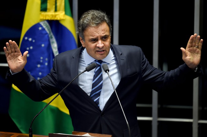 O senador Aécio Neves (PSDB-MG) falou na noite desta quarta-feira (11). | Evaristo Sá/AFP