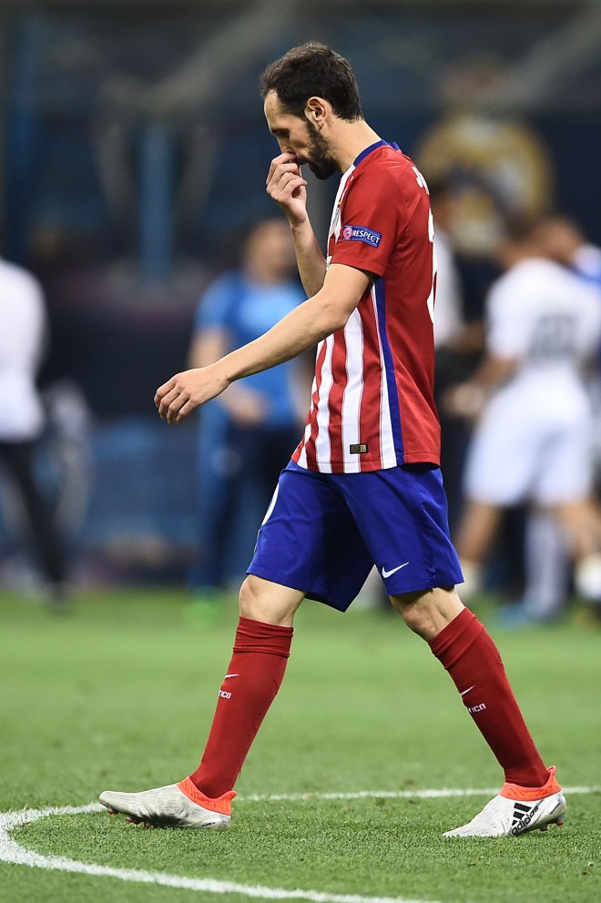 Jogadores do Atlético de Madrid ficaram desolados com a derrota | FILIPPO MONTEFORTE/AFP