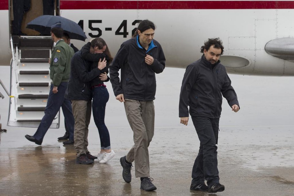 José Manuel Lopez, Antonio Pampliega e Ángel Sastre foram sequestrados pela al-Qaeda | DIEGO CRESPO/AFP