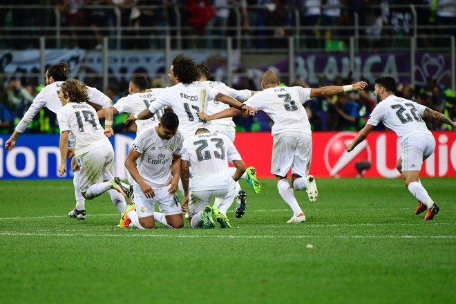 Jogadores do Real comemoram no San Siro | PIERRE-PHILIPPE MARCOU/AFP