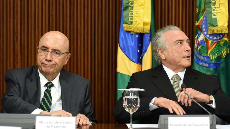 Meirelles e Temer anunciam medidas econômicas. | EVARISTO SA/AFP