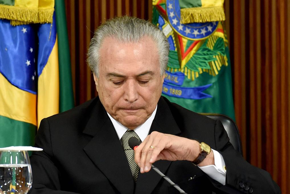 Temer: às voltas com áudios que implicam aliados na Lava Jato. | Evaristo Sá/
AFP