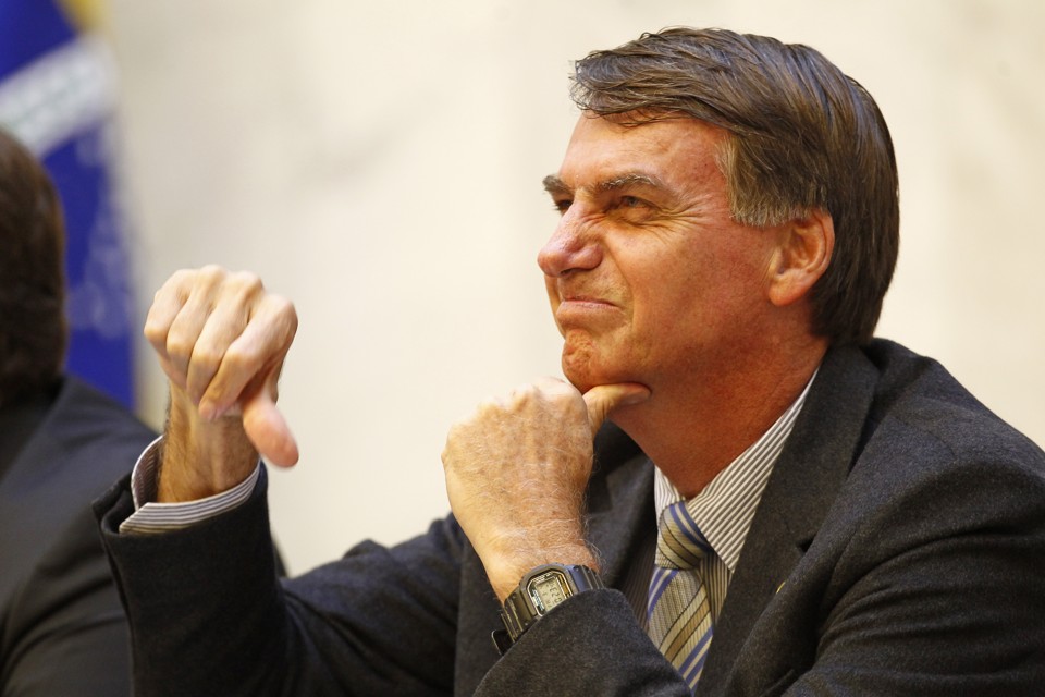 “Duvido que uma mulher armada seja estuprada por um canalha qualquer”, afirmou Bolsonaro em visita ao Paraná em março deste ano | Antônio More/Gazeta do Povo/Arquivo