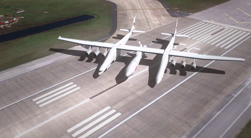Projeção mostra avião gigantesco em uma pista de decolagem; Stratolaunch está 76% concluído, segundo a Vulcan Aerospace | Reprodução/Vulcan Aerospace