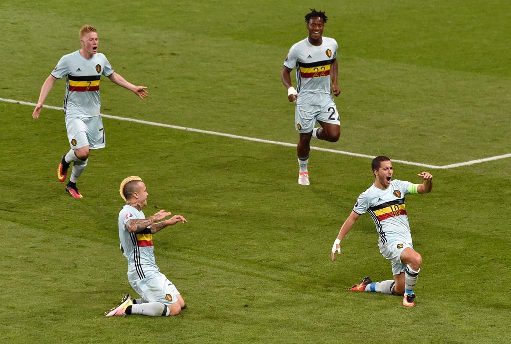 Festa dos jogadores da Bélgica: quatro gols e vaga assegurada nas quartas de final. | Pascal Pavani/AFP