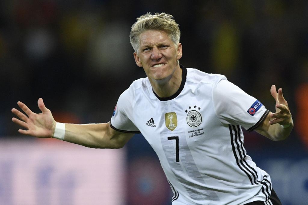 Schweinsteiger comemora o segundo gol contra a Ucrânia. | MARTIN BUREAU/AFP