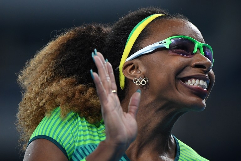 A atleta Rosângela Santos, do Brasil, comemorou oito anos depois a medalha de bronze conquistada em Pequim. | OLIVIER MORIN / AFP/
