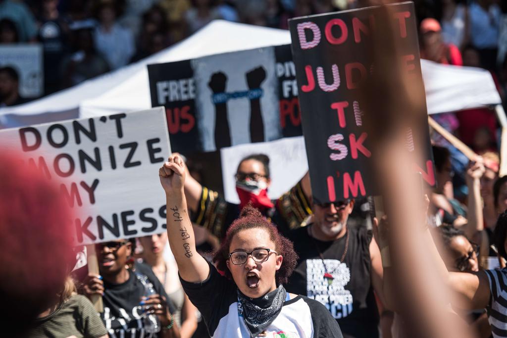 Cidadãos protestam contra a morte de Keith Scott. | Sean Rayford/AFP