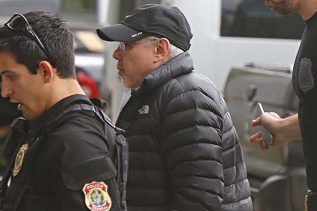 Mantega (de boné) foi preso e libertado no mesmo dia | MARCOS BEZERRA/ESTADÃO CONTEÚDO