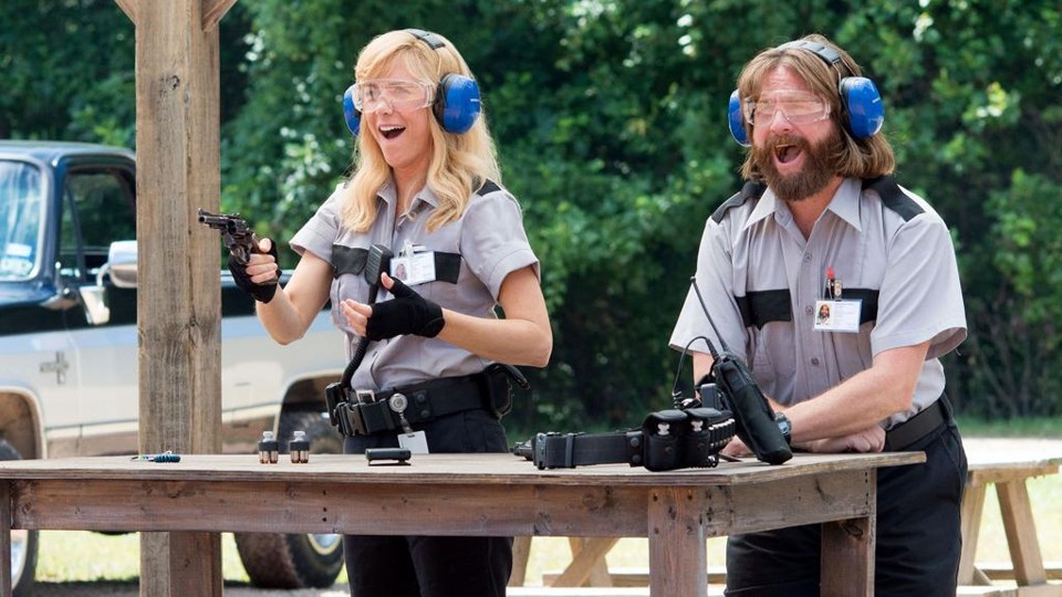 Kristen Wiig e Zach Galifianakis: ótimos atores, comédia pastelão | Glen Wilson/Relativity Media-Armored Car Pro