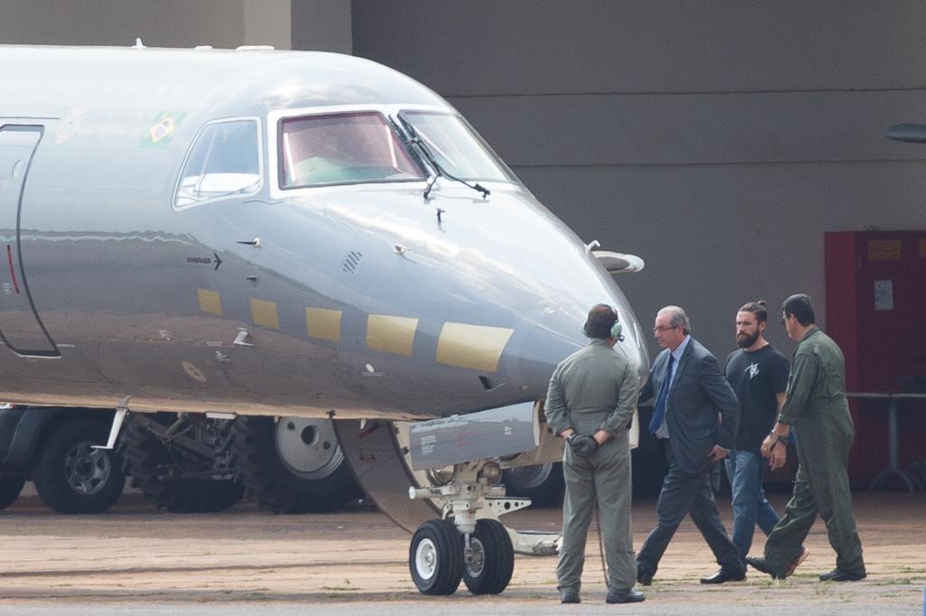 Eduardo Cunha foi transportado em uma aeronave da Polícia Federal. | Andressa Anholete/AFP