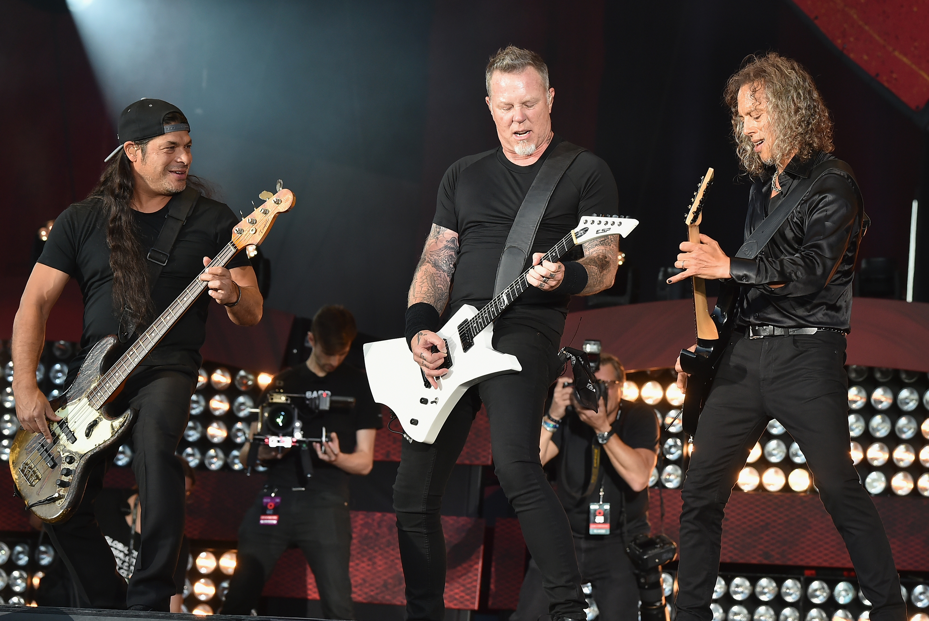 Robert Trujillo, James Hetfield e Kirk Hammett, | Theo Wargo/AFP