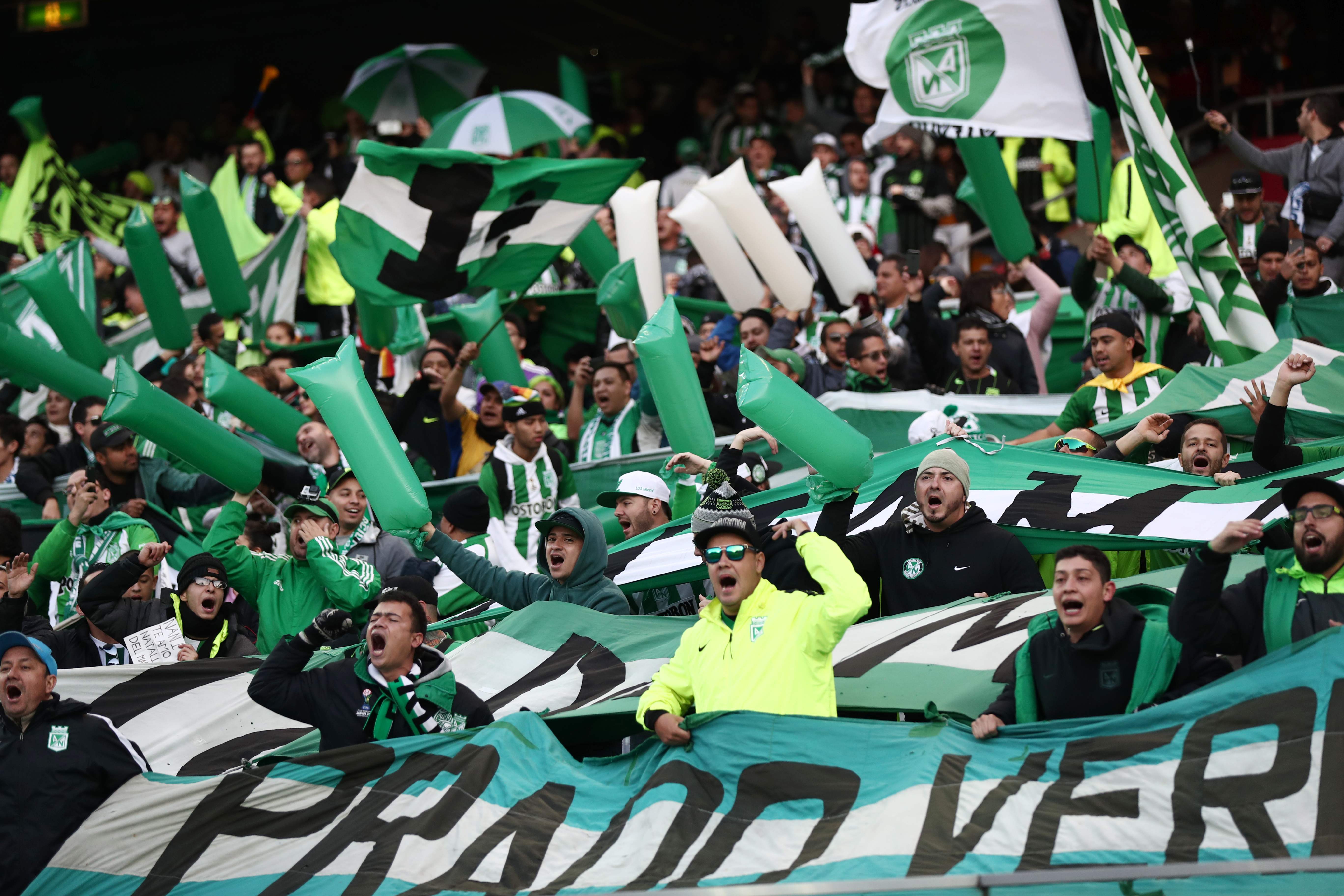 Torcedores do Atlético Nacional, da Colômbia, durante o jogo que deu o terceiro lugar no mundial de clubes para a equipe | BEHROUZ MEHRI/AFP