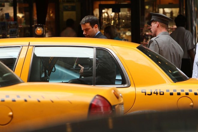 Aplicativos tiveram quase o mesmo número de viagens que os táxis amarelos de Nova York no último mês de novembro. | sp/aek/Spencer Platt/AFP