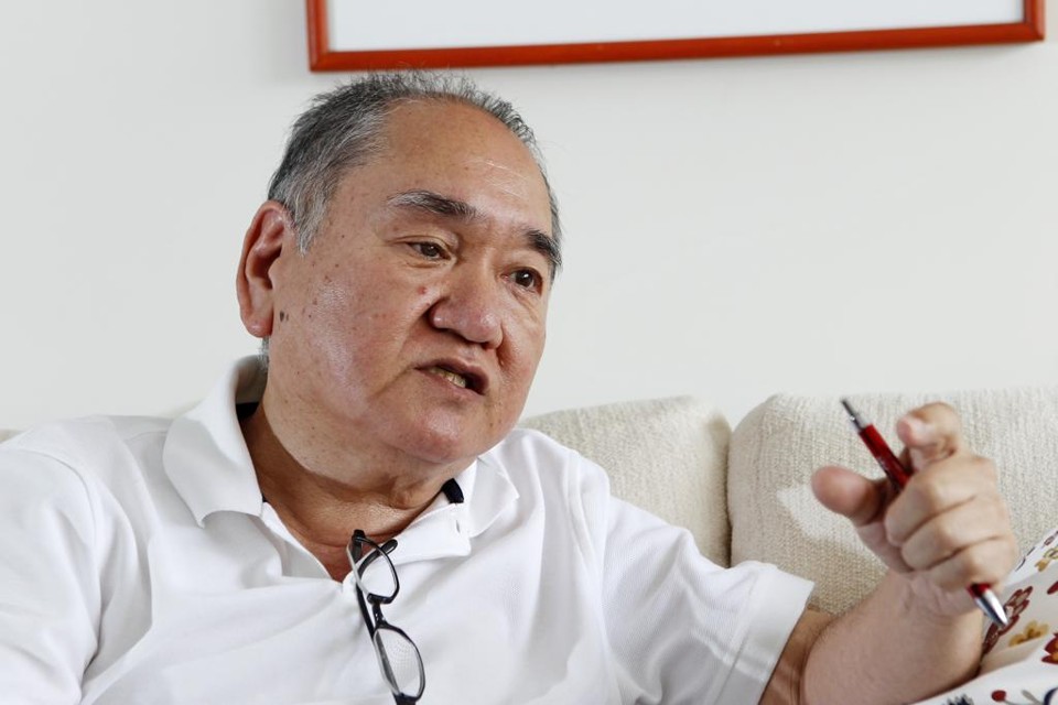 Livro Curitiba: o Fazimento de uma Cidade conta os bastidores  do planejamento urbano da cidade, com  relatos de Rafael Dely e pesquisa de Marcelo Oikawa (foto). | Antônio More/Gazeta do Povo