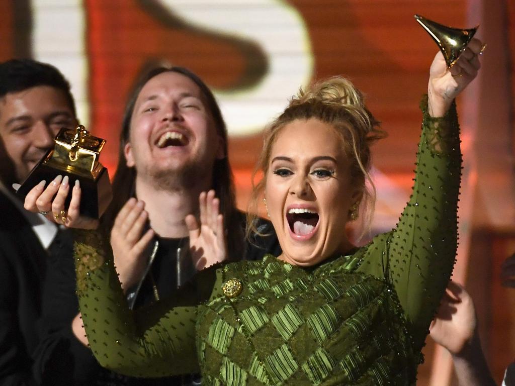 Adele quebrou seu Grammy em dois e ofereceu a Beyoncé | Kevork Djansezian/AFP