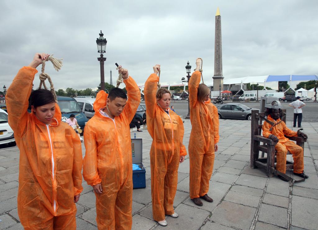Ativistas protestam contra a pena de morte nos Estados Unidos. | Mehdi Fedouach/AFP