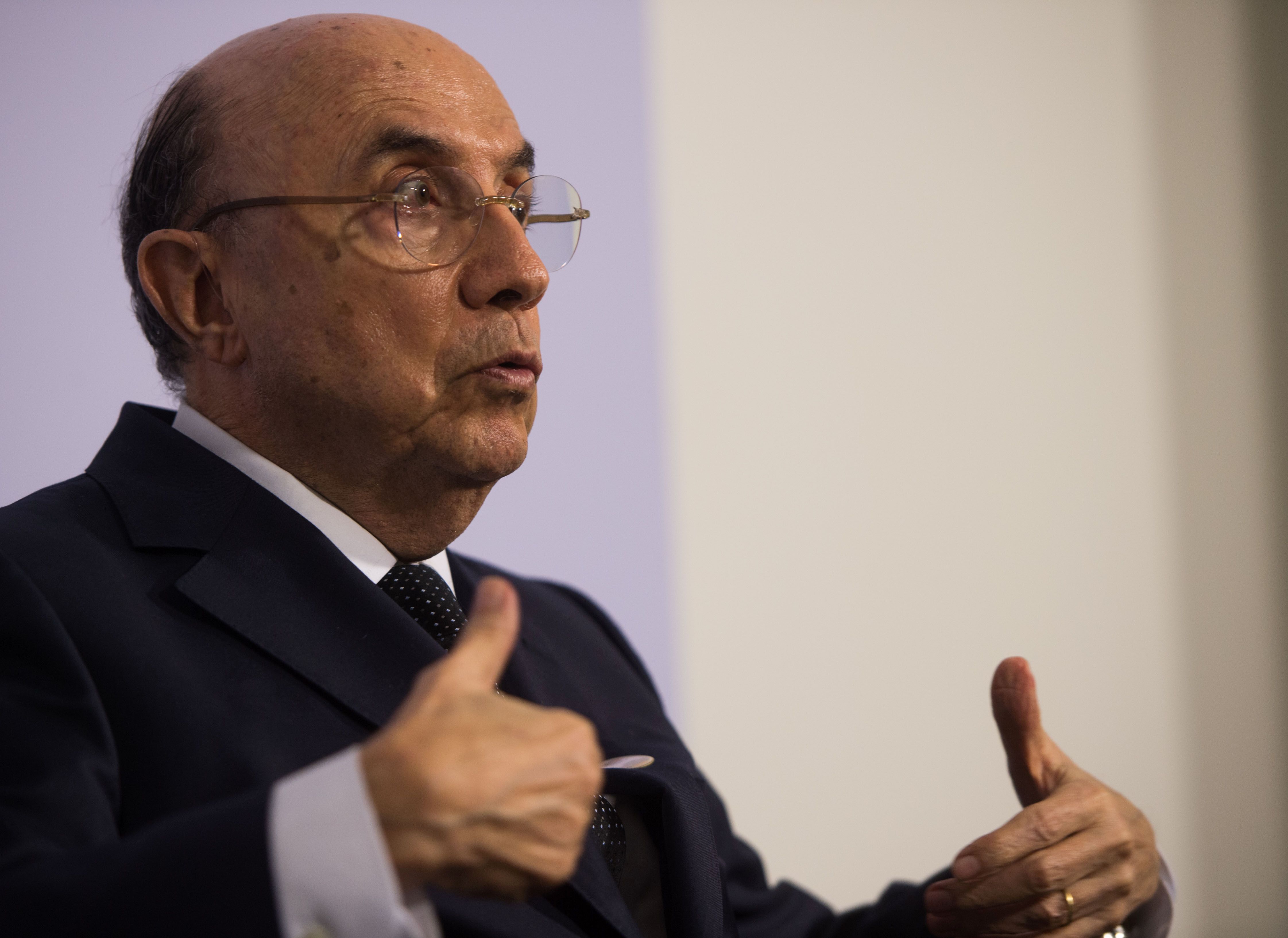 Ministro da Fazenda e o presidente do Banco Central, Ilan Goldfajn, se encontraram com o secretário-geral da OCDE na Alemanha. | Lino Mirgeler/AFP