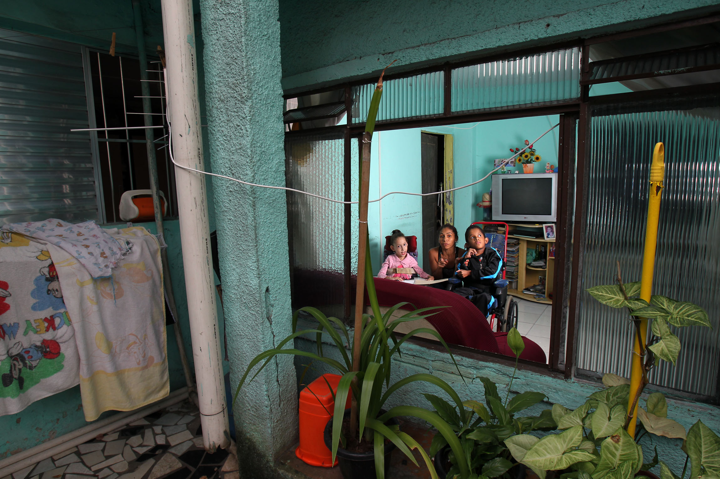 Os filhos de Márcia Batista, com paralisia cerebral, tiveram problemas de atendimento em colégios regulares | Werther Santana/Estadão Conteúdo