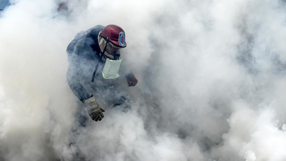 Protestos contra o governo de Nicolás Maduro completam três semanas. | Juan Barreto/AFP