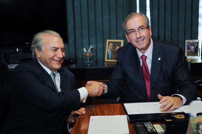Presidente Michel Temer e Eduardo Cunha: ex-deputado do PMDB teria muito a contar em eventual delação premiada. | Fábio Rodrigues Pozzebom/AFP