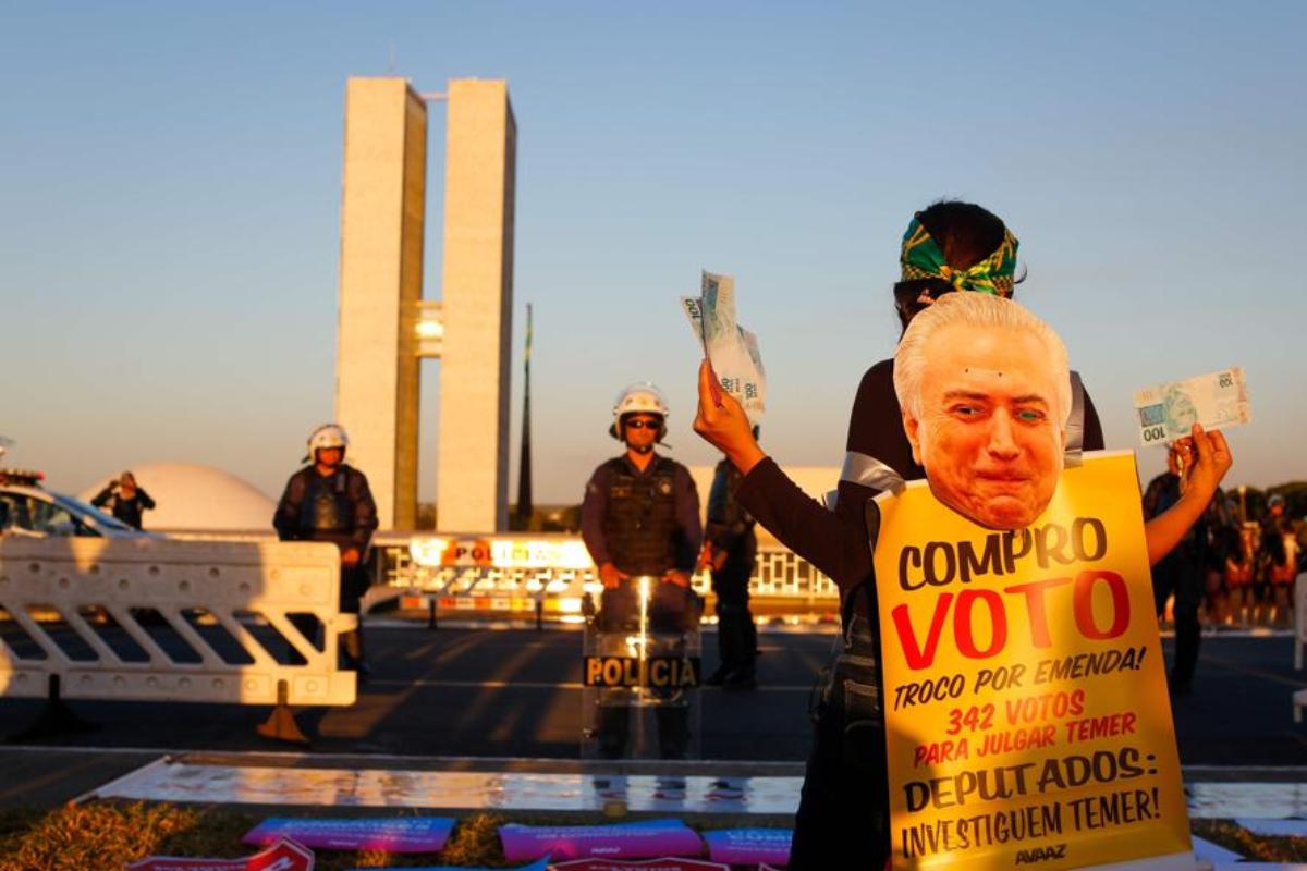 Protestos do lado de fora do Congresso Nacional foram tímidos durante votação da denúncia contra Temer | Sérgio Lima/AFP